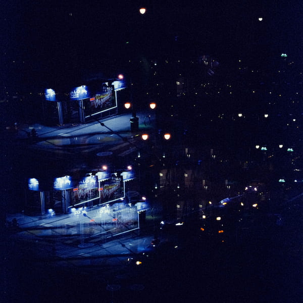 A multiple exposure of a closed grocery store at night